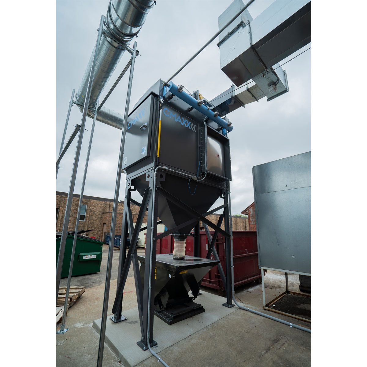 CMAXX dust collector with self dumping hopper